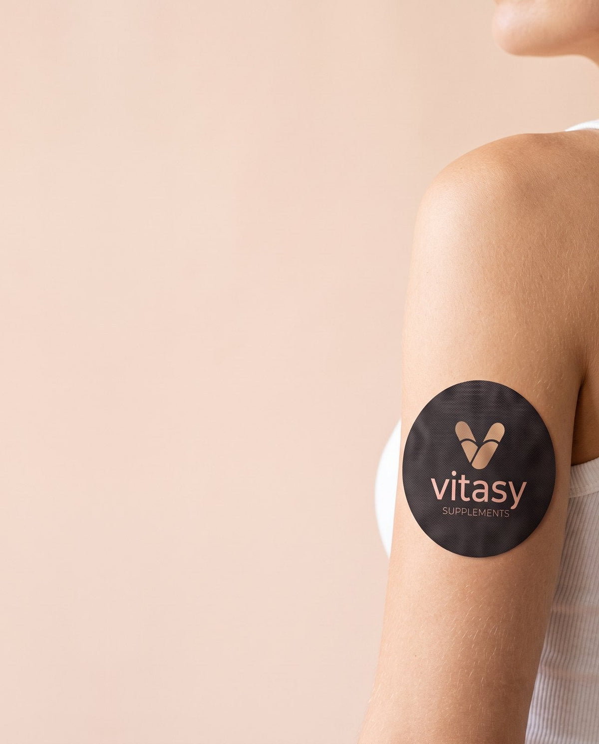 Vitasy patch worn on the upper arm