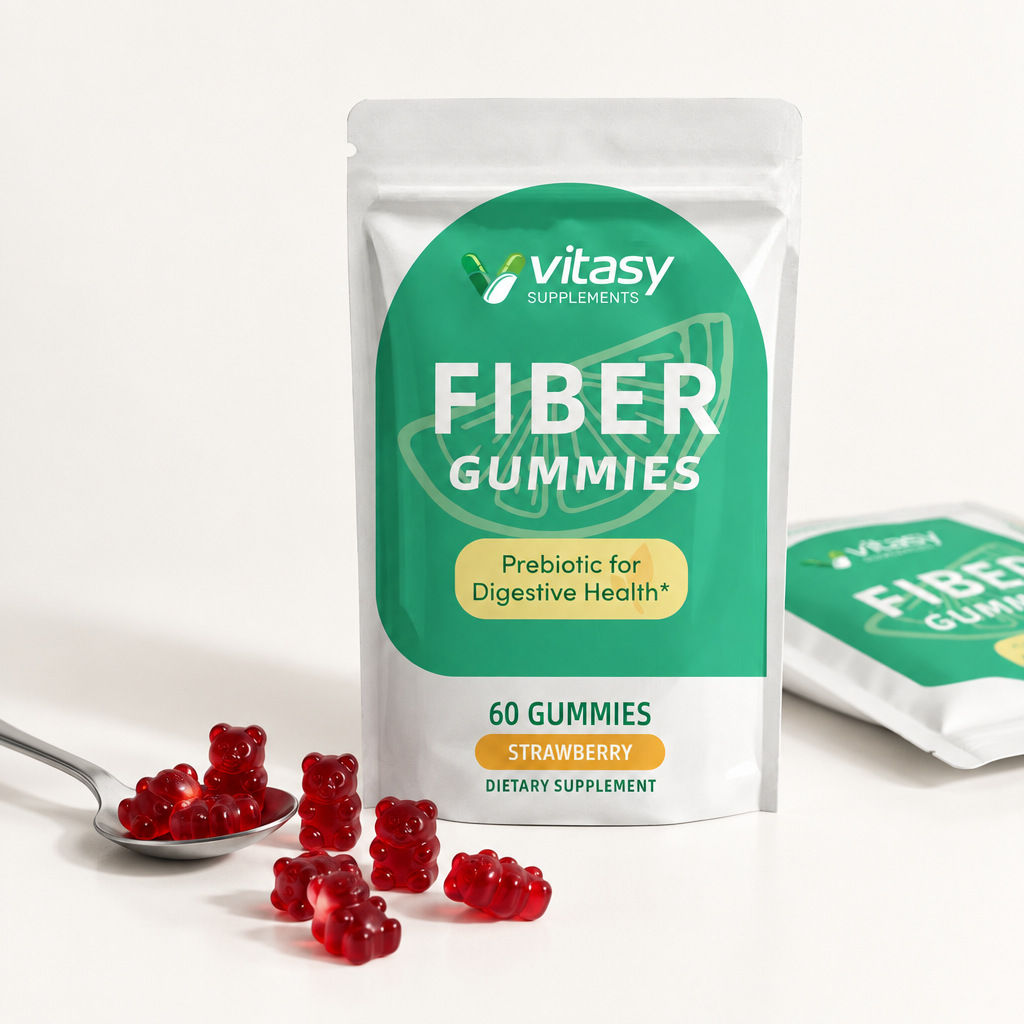 Fiber Gummies - Strawberry pouch on white with loose gummies and spoon