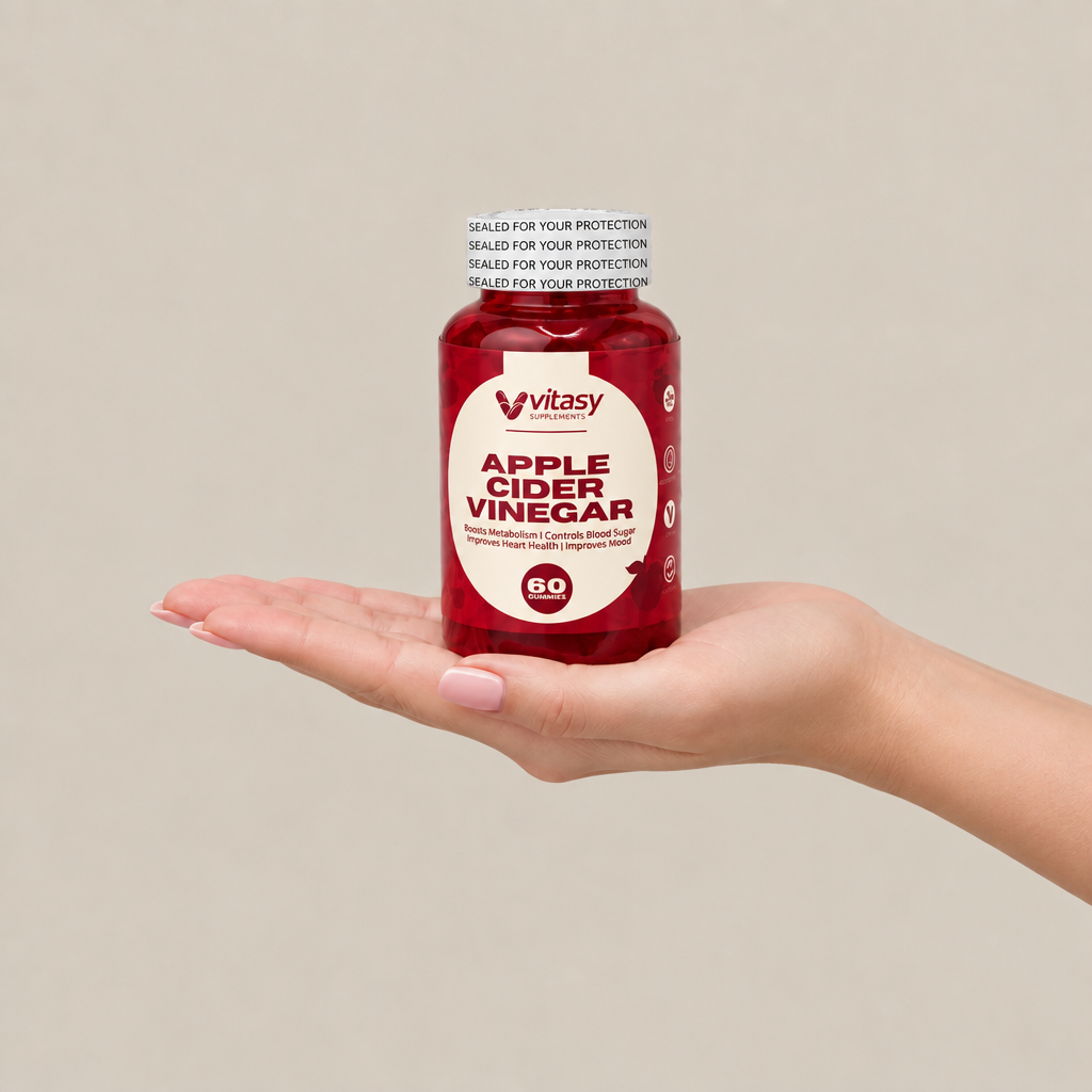 Vitasy Apple Cider Vinegar Gummies bottle resting on an open palm