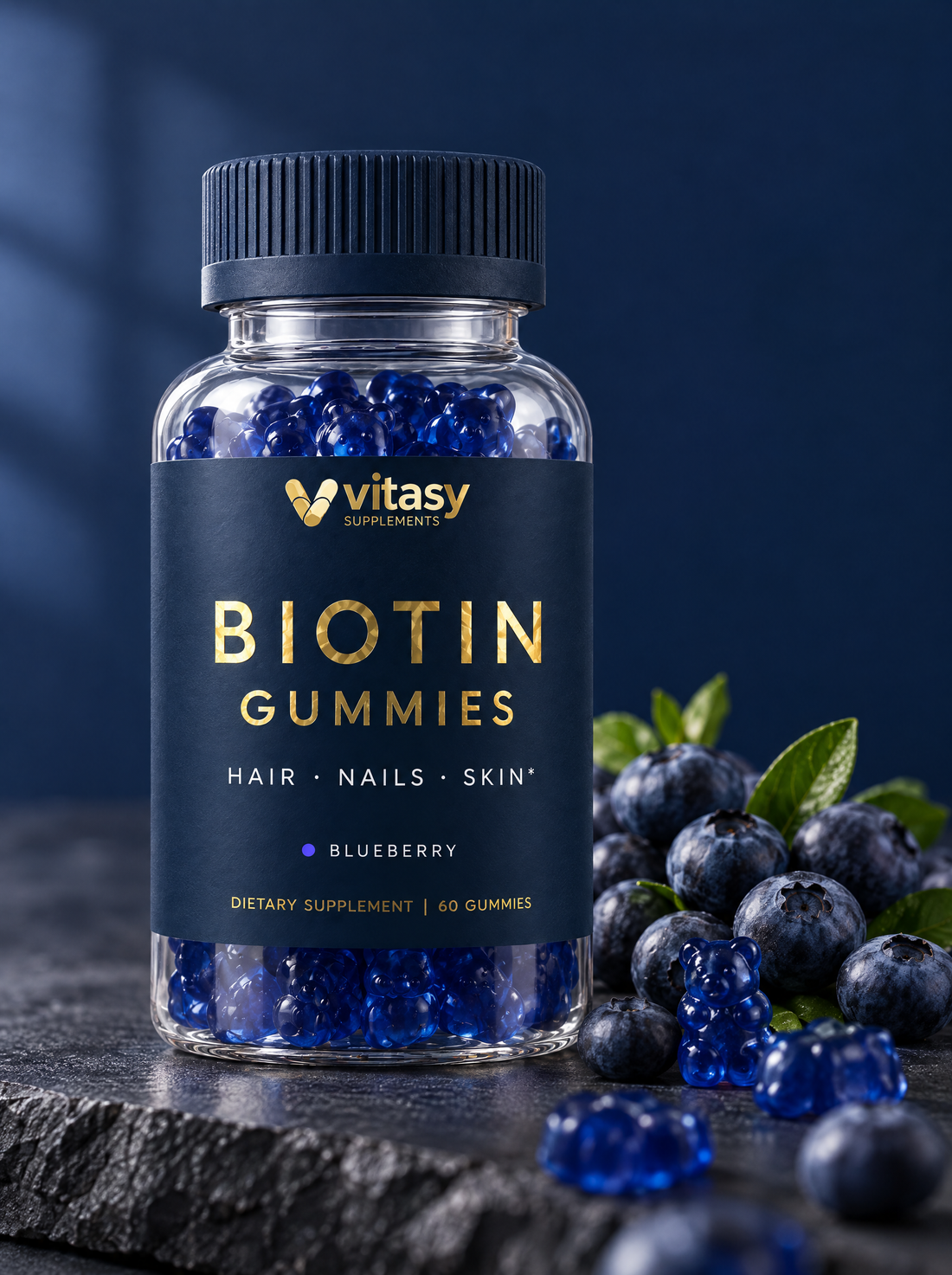 Vitasy Biotin Gummies Blueberry, navy bottle with gold foil label, 60 gummies, with fresh blueberries