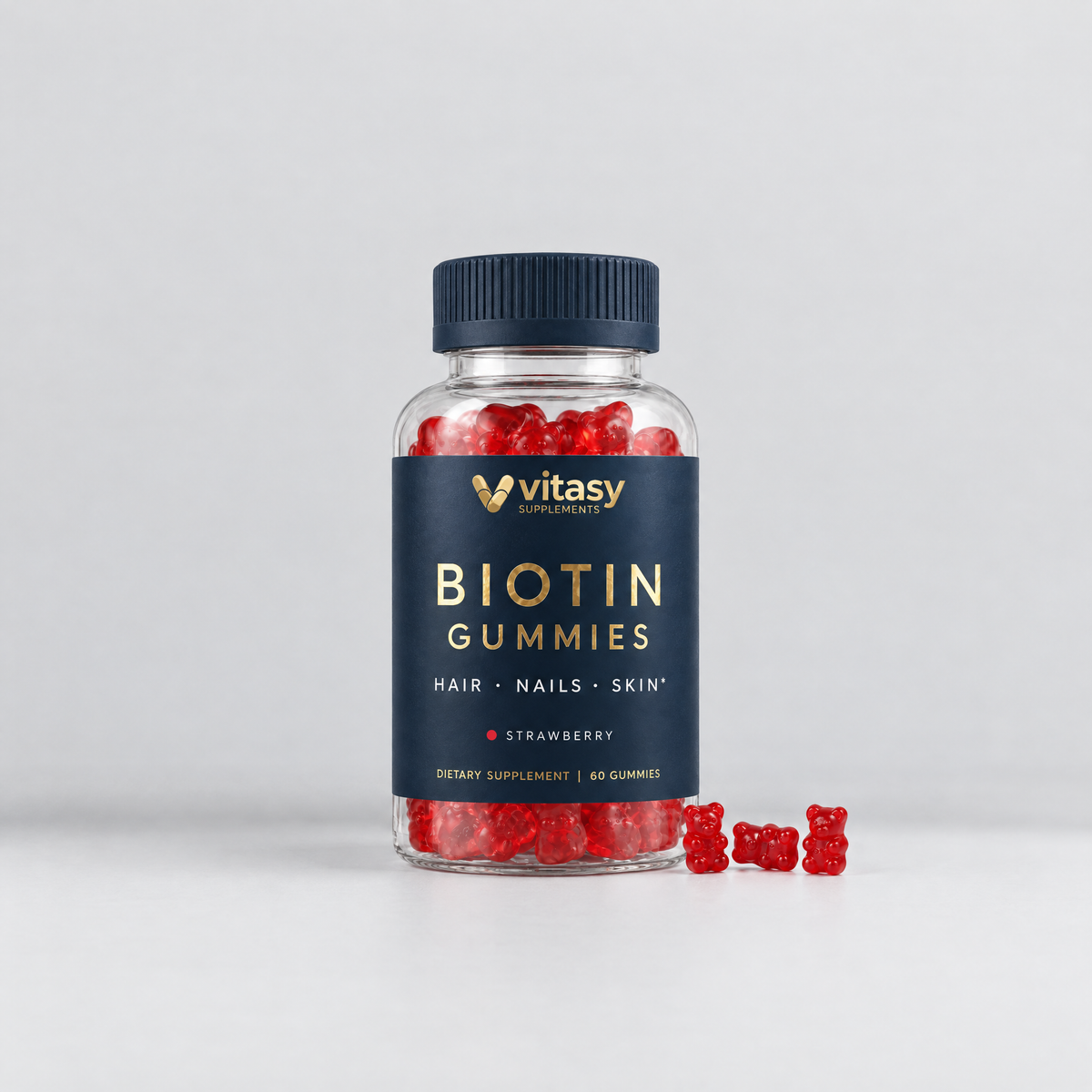Vitasy Biotin Gummies Strawberry, navy bottle with gold foil label, 60 gummies