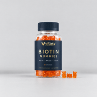 Vitasy Biotin Gummies Orange, navy bottle with gold foil label, 60 gummies