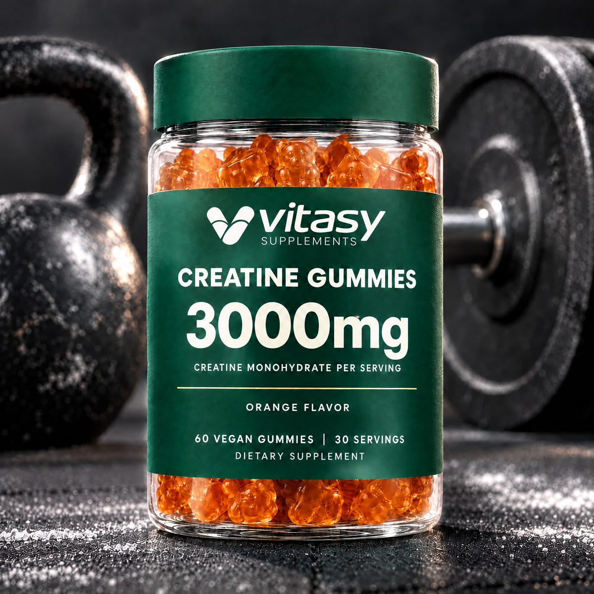 Orange Vitasy Creatine Gummies jar on a gym floor with a kettlebell and weight plate