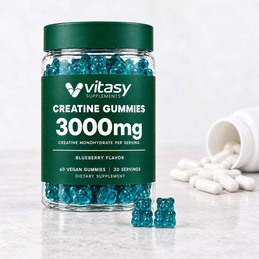 Vitasy Creatine Gummies jar, blueberry flavor, with two gummies in front and capsules out of focus behind