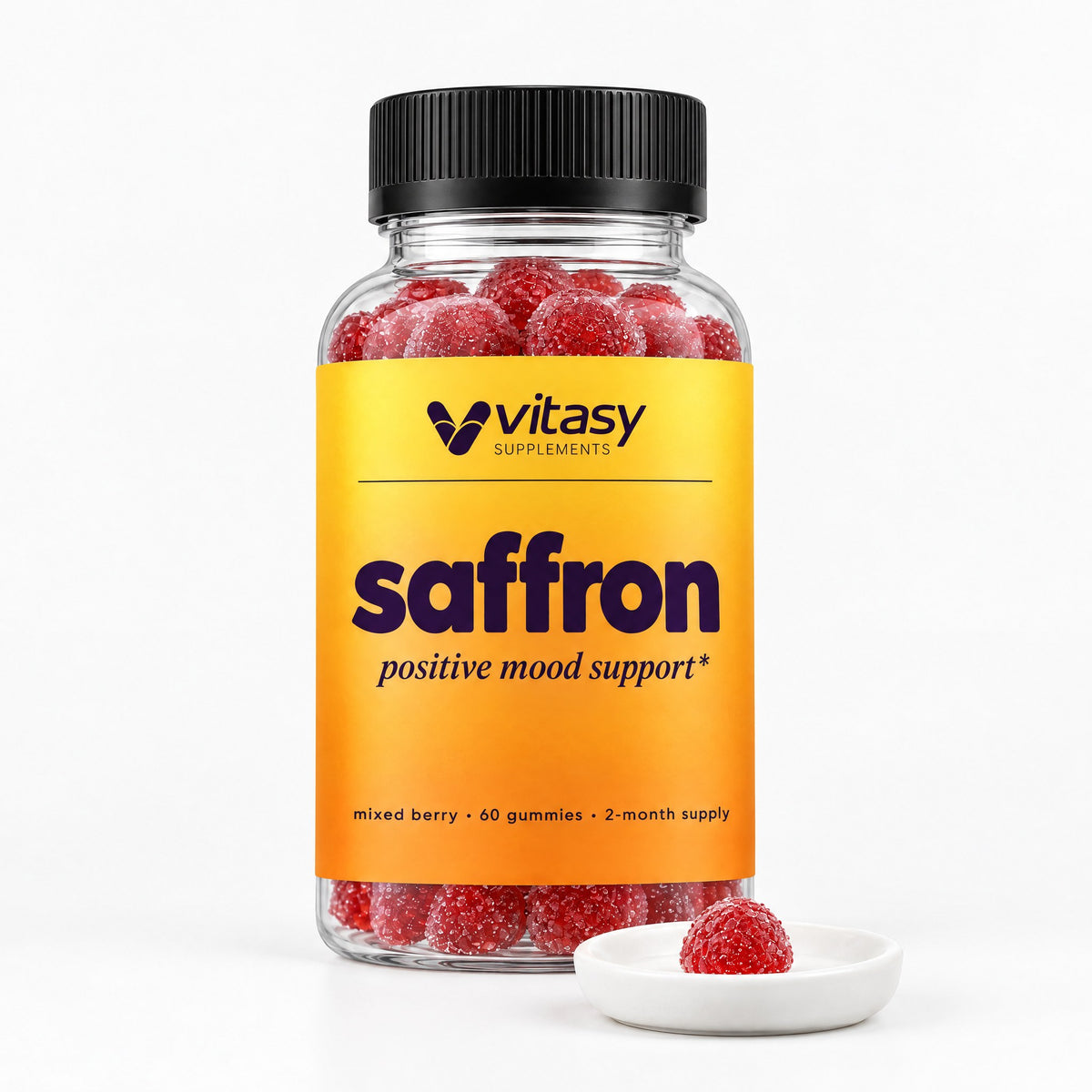 Vitasy saffron gummies bottle with a single gummy on a white dish