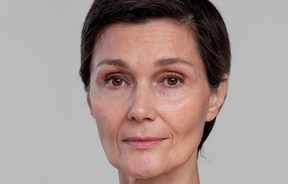 Close-up portrait of a woman, before