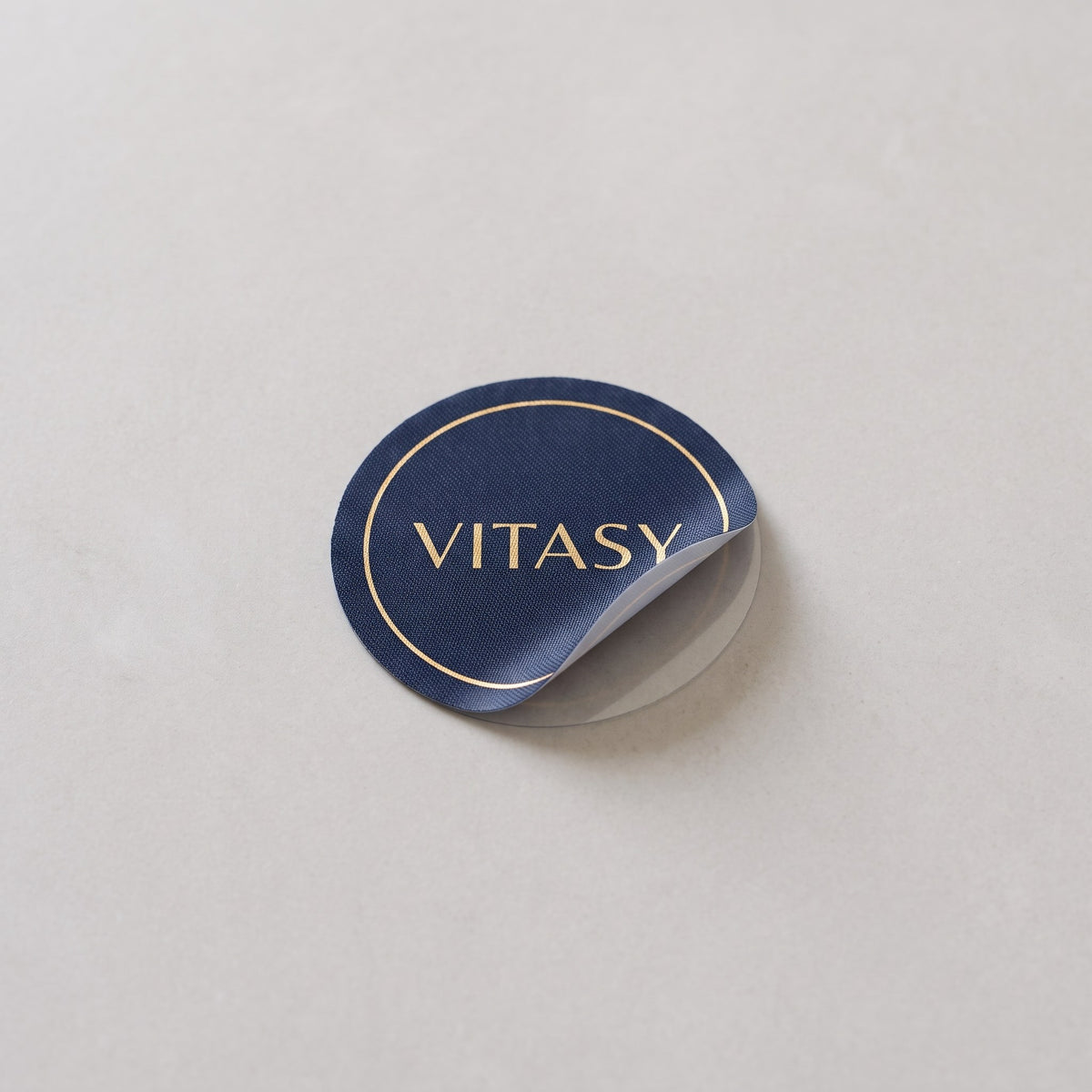 A single Vitasy patch with its edge lifted