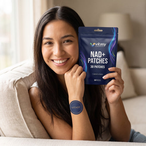 Woman holding a Vitasy NAD+ Patches pouch at home