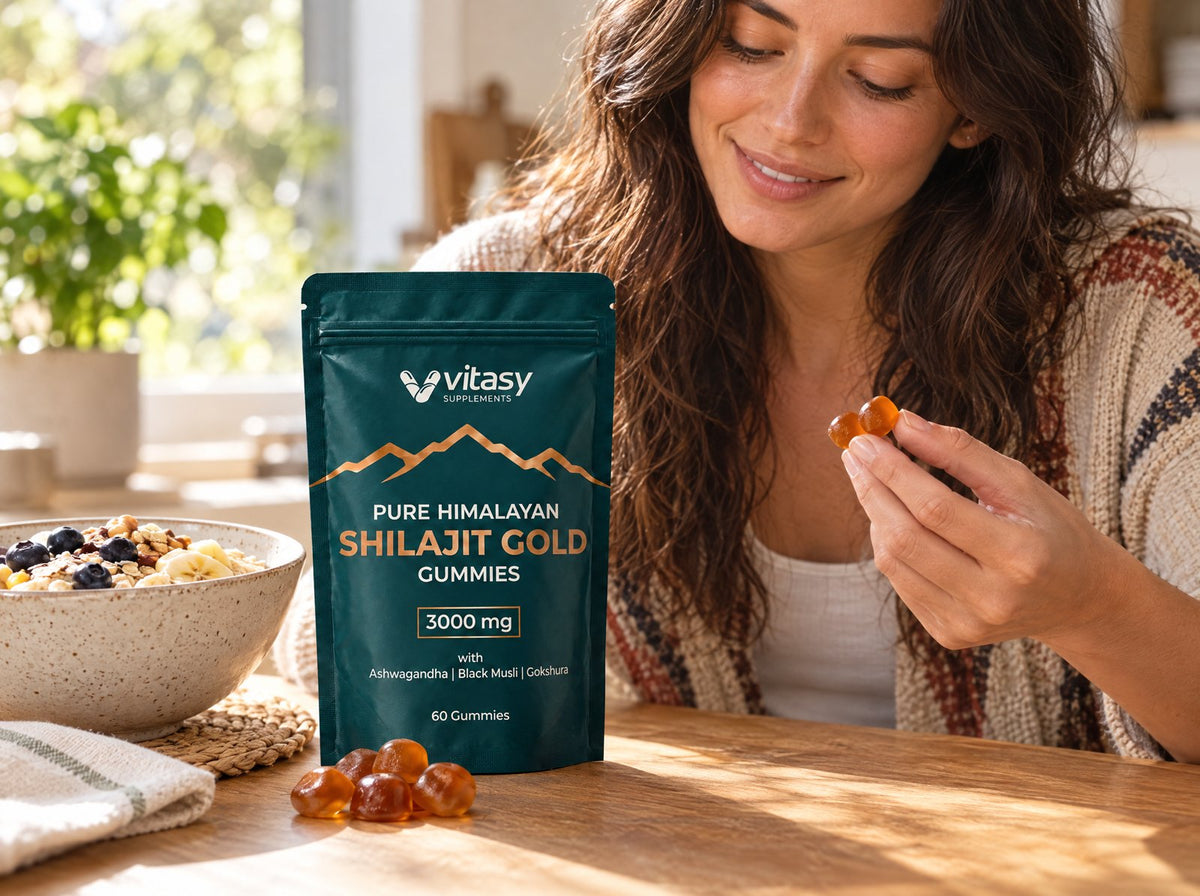 Hand holding a shilajit gummy at breakfast
