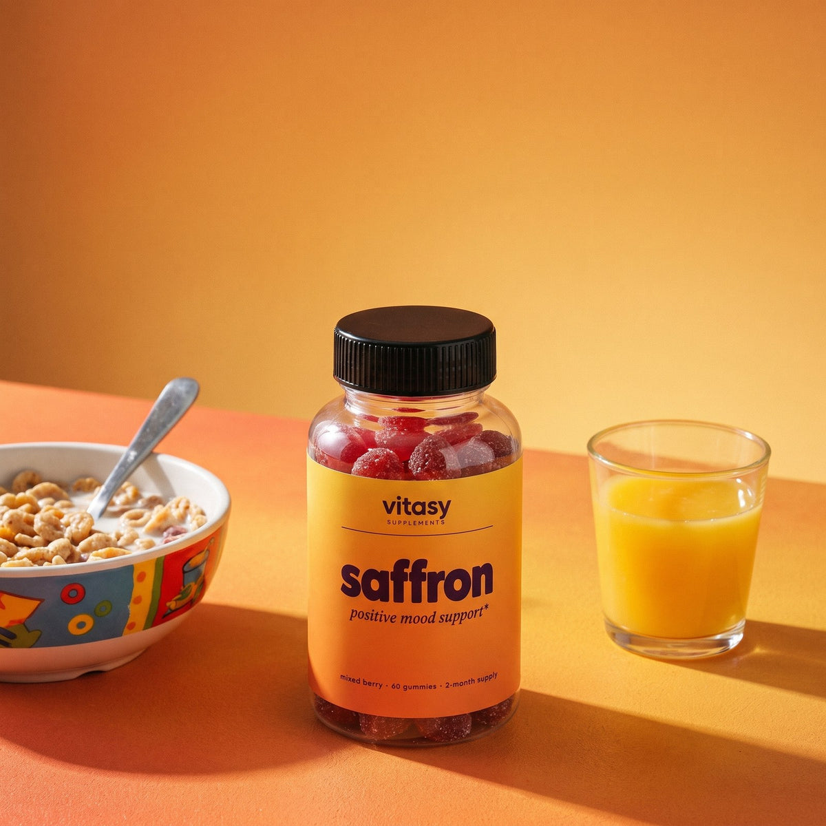 Vitasy Saffron Gummies on a breakfast table with a bowl of cereal