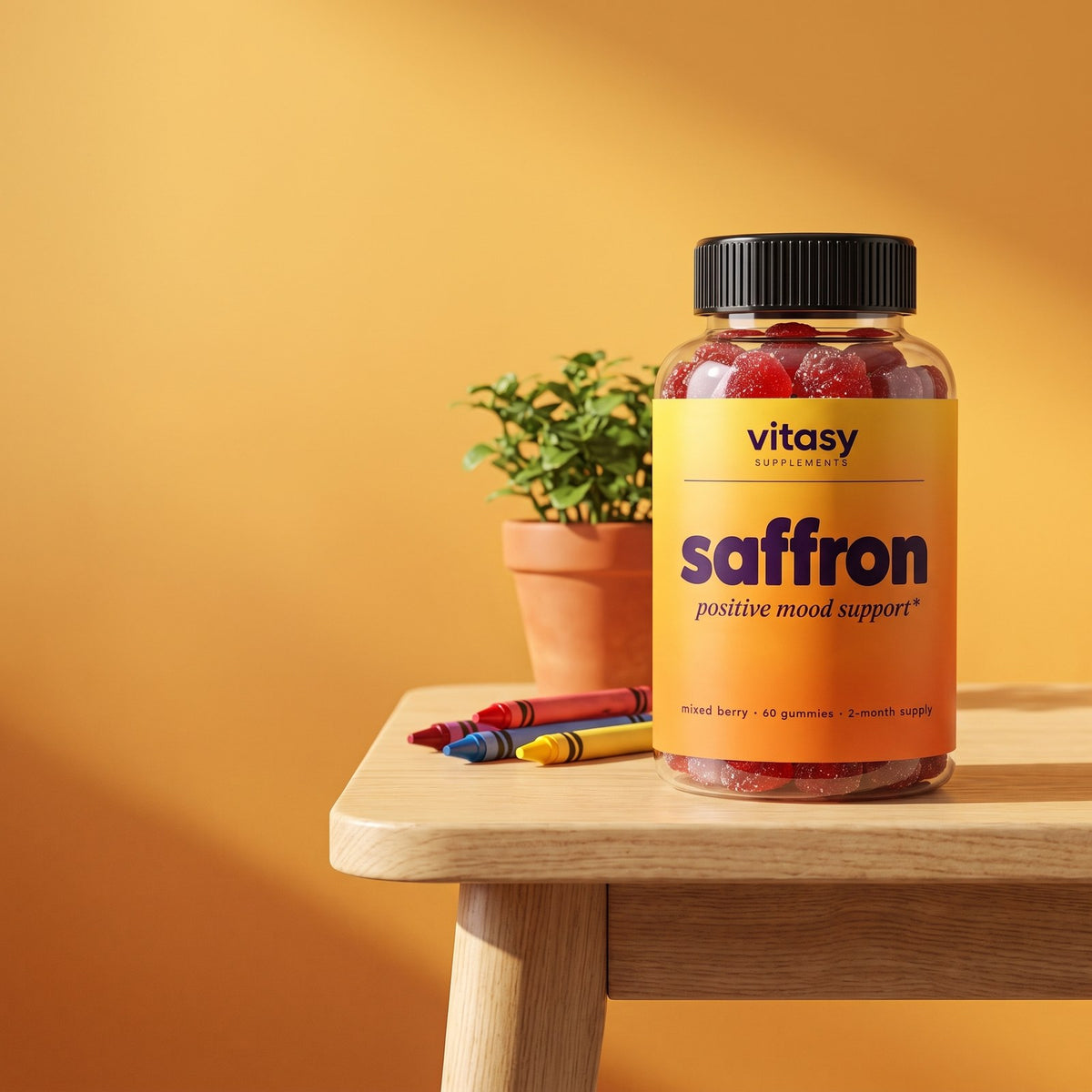 Vitasy Saffron Gummies bottle on a kids' table
