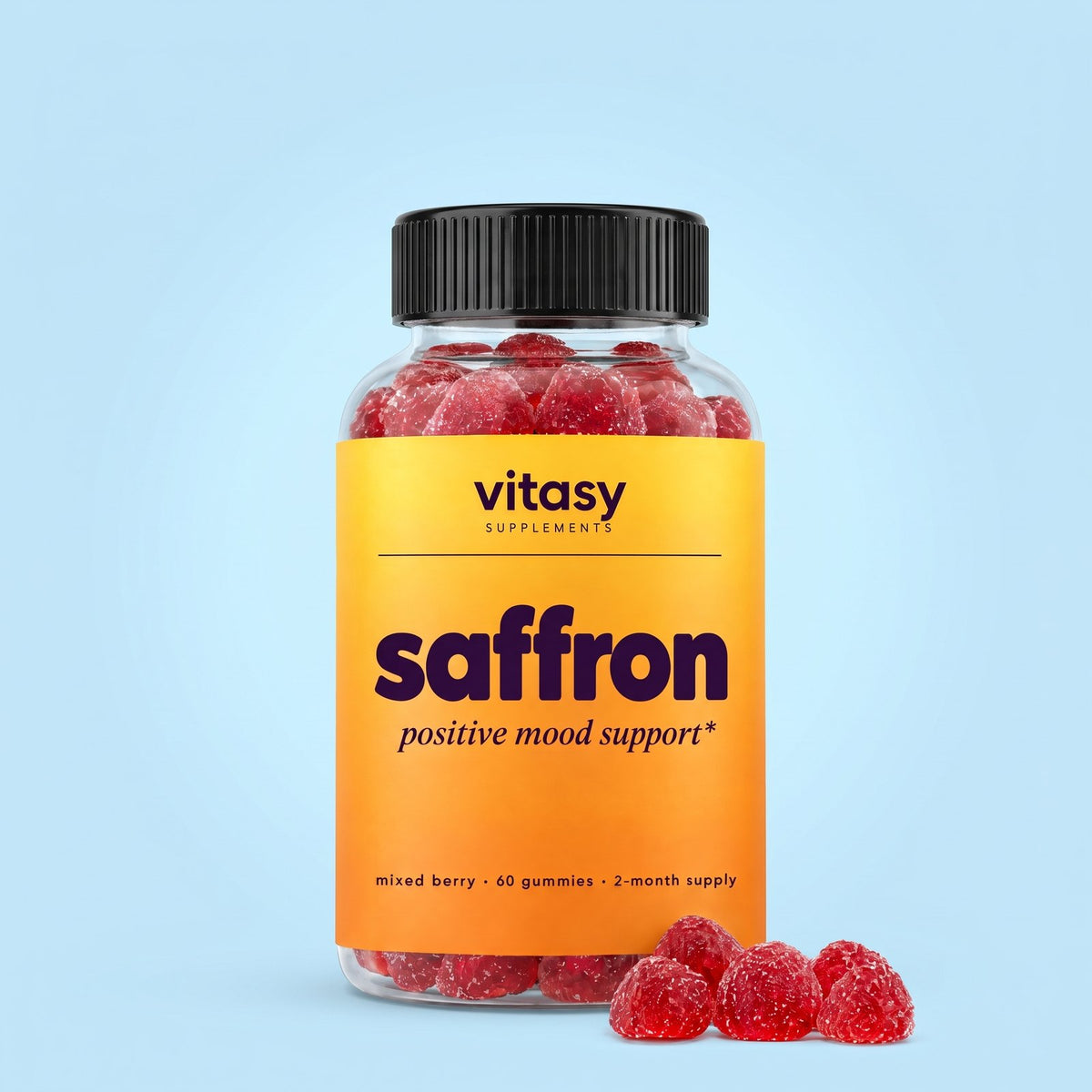Vitasy Saffron Gummies jar with mixed berry gummies on a light blue background