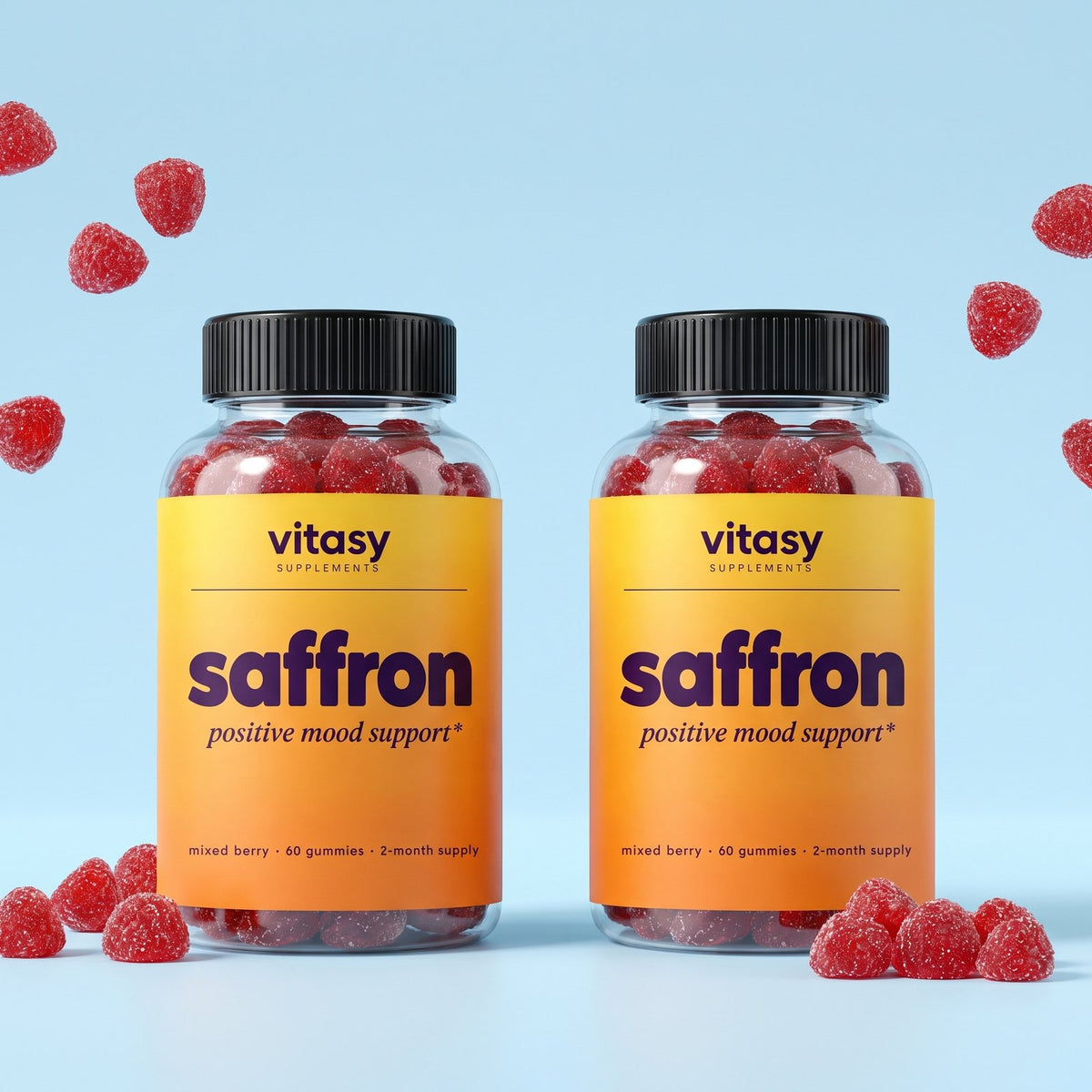 Two jars of Vitasy Saffron Gummies with mixed berry gummies