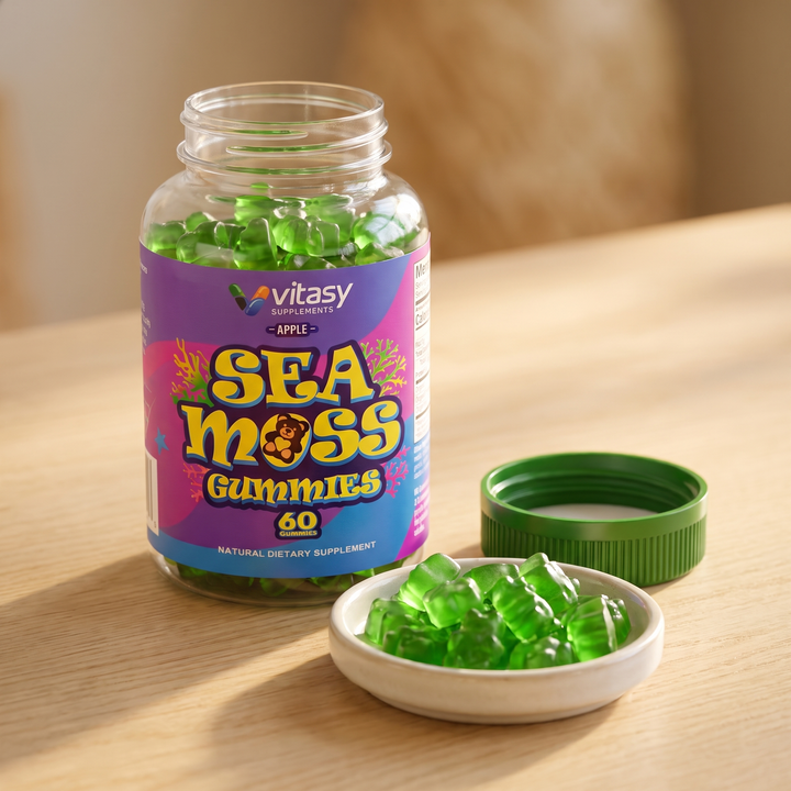 Open Vitasy Sea Moss Gummies bottle beside a dish of green gummies