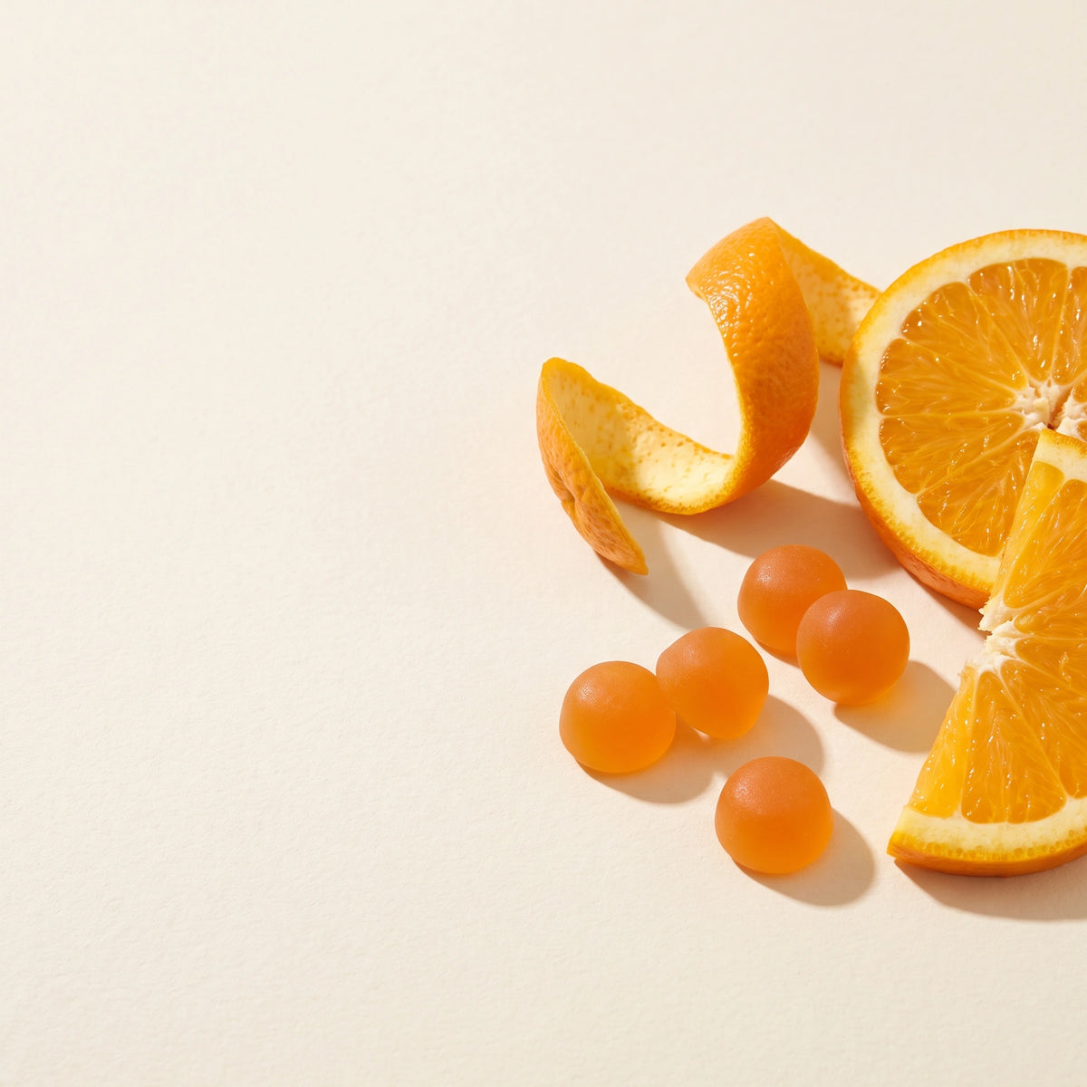 Vitasy Vitamin C Gummies v3 — benefit visual translated to claim-free Orange context — Orange