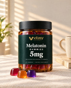 Vitasy Melatonin Gummies jar with red, orange and purple gummies in a sunny room