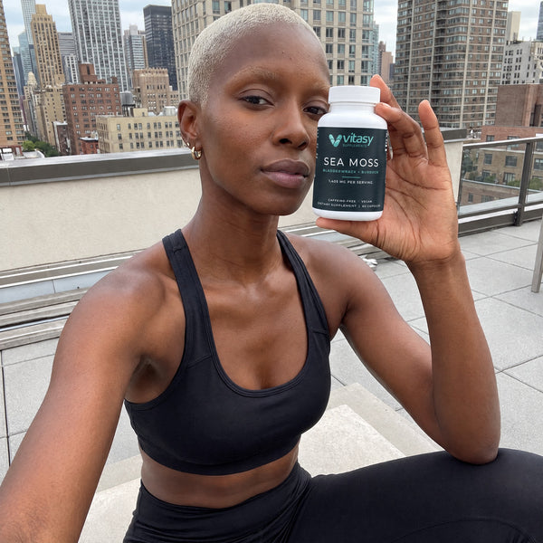 People holding Sea Moss Capsules at home and on the go