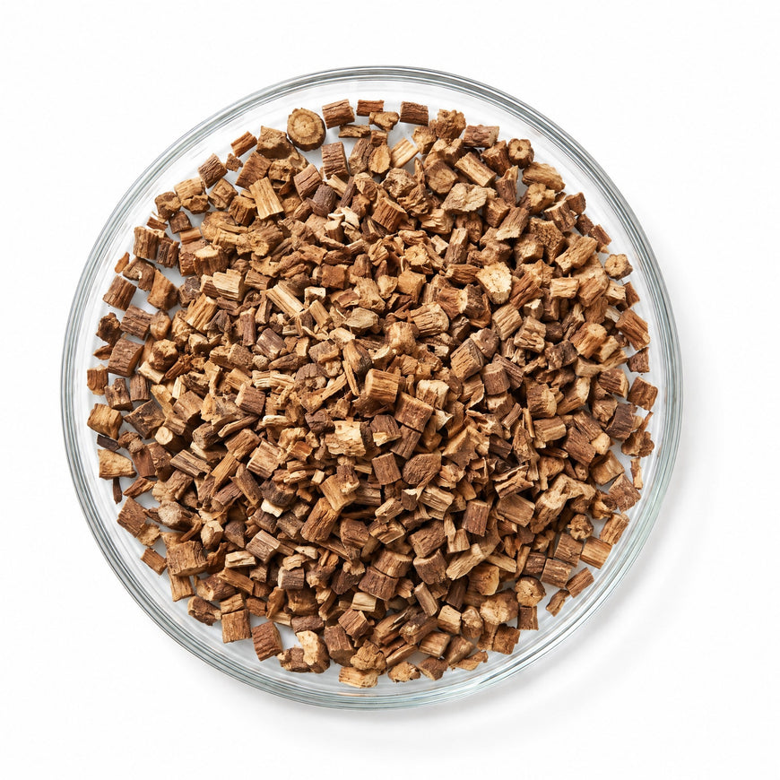 Dried burdock root pieces in a glass dish